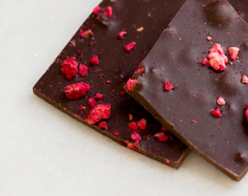 Dark Chocolate Raspberry Bark · Dark chocolate with 70% cocoa and freeze dried raspberries.  The tangy raspberries counterpoint the natural bitterness of the dark chocolate. Note: contains soy.