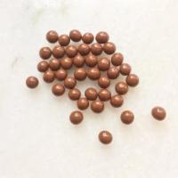 Milk Chocolate Crunchy Pearls · Toasted puffed cereal enrobed in caramelized 36% milk chocolate. Note: contains wheat and mi...