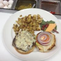 Mushroom Swiss Burger · a fresh 8 oz Prime Black Angus burger topped with sauteed mushrooms, Swiss cheese, lettuce, ...