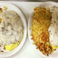 Country Omelette · Sausage, American cheese and topped with country gravy.