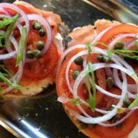 Loaded Bagel · Toasted everything or plain bagel, choice of scallion or plain cream cheese, smoked salmon, ...