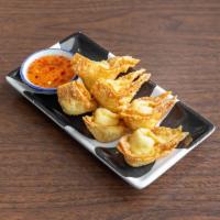 Crab Rangoon · 6 pieces. Deep-fried blended crab, cream cheese and celery, wrapped with wonton skin.