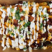 Buffalo Fries · Choice of straight cut fries or tater tots, Buffalo sauce, blue cheese crumbles, house-made ...