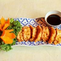 Pork Gyoza · Japanese pork dumplings served steamed or fried. Served with ginger sauce.