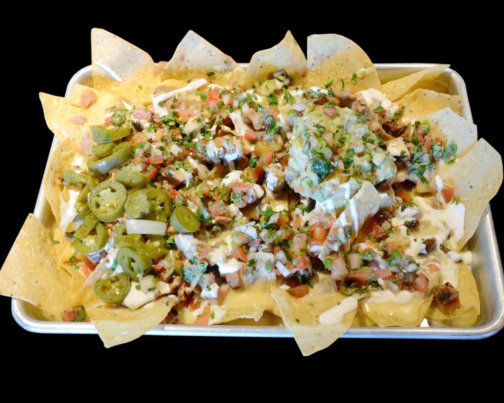 Nachos · Tortilla chips topped with refried beans, melted cheese, pico de gallo, jalapenos, sour cream and guacamole.
