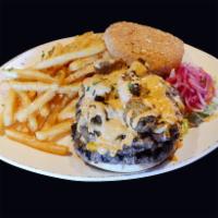 El Jefe · 2 sirloin patties with Monterrey Jack and American cheese, sliced tomato, red onion and chip...