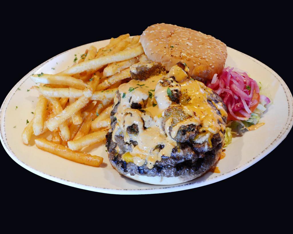 El Jefe · 2 sirloin patties with Monterrey Jack and American cheese, sliced tomato, red onion and chipotle ranch.