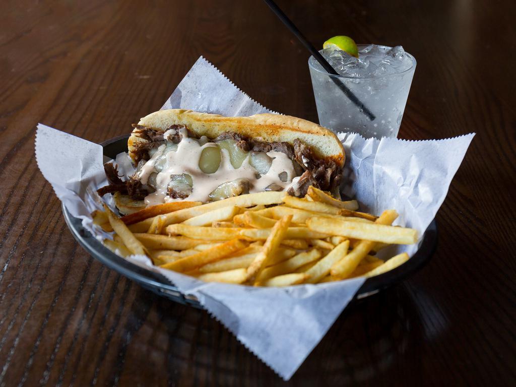 Pot Roast Sandwich · Tender pork roast piled high on a  hoagie, topped with melted provolone cheese and drizzled with southwest sauce.
