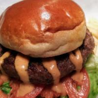 Big Burger · ½ lb. beef burger, lettuce, tomatoes, bite down sauce on brioche.