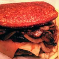Big Mouth Melt · ½ lb. patty on white or wheat bread pepper jack and cheddar cheese, sautéed mushrooms, and o...