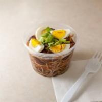 Yakamein  · 12 oz. soy sauce based broth with spaghetti beef eggs and green onion.