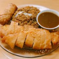 15. Almond Boneless Chicken Dinner Combo 杏仁鸡  · Gravy on the side. Served with fried rice and egg roll.
