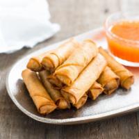 Spring Roll 菜卷 · Rice paper or crispy dough filled with shredded vegetables. Add sauces for an additional cha...