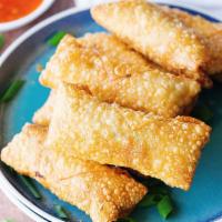 Egg Roll 春卷 · Crispy dough filled with minced vegetables. Add sauces for an additional charge.