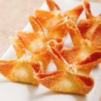 Crab Rangoon 蟹角 · 6 pieces. With sweet and sour sauce. Add sauces for an additional charge.