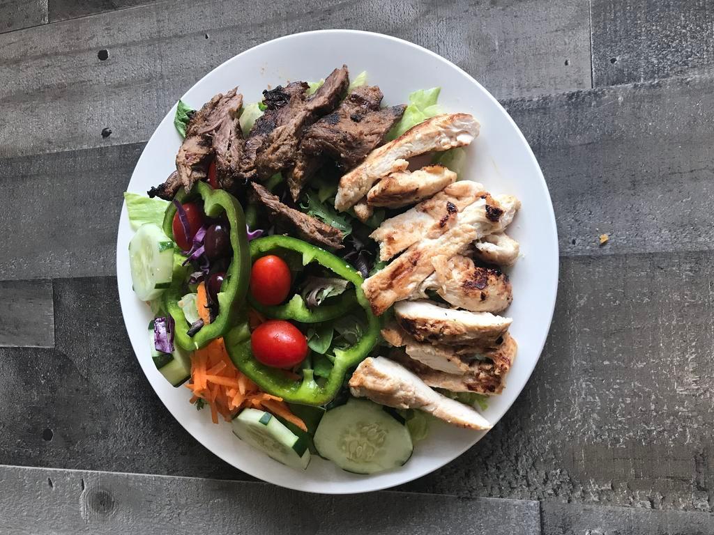 Combo salad  · Grilled chicken and steak tips over garden salad