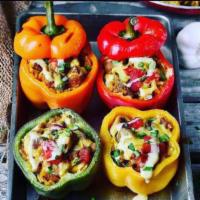 Grilled Stuffed Pepper · Stuffed peppers with quinoa, mixed vegetables, Ground beyond sausage , beans and house sauce 
