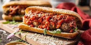 Vegan Sub · Beyond meat stuffed meatballs topped with vegan cheese and marinara served with fries