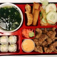 Chicken Karaage Bento Box · Choice of chicken or fish. Served with Steamed Rice, House Salad, Miso Soup, Veggie Egg Roll...