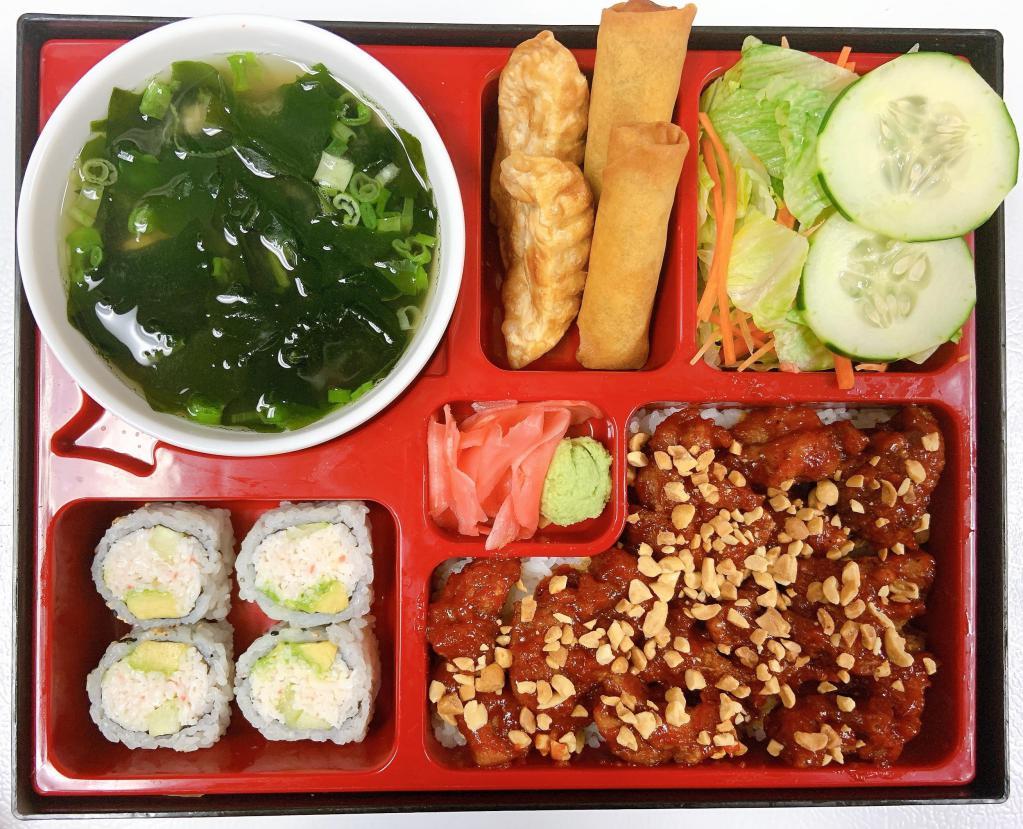 Spicy Chicken Bento Box · Served with steamed rice, house salad, miso soup, 2 pieces veggie egg roll, 2 pieces fried gyoza and 4 pieces California roll. Spicy.