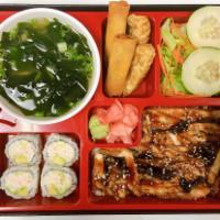 Unagi Bento Box · Served with steamed rice, house salad, miso soup, 2 pieces veggie egg roll, 2 pieces fried g...
