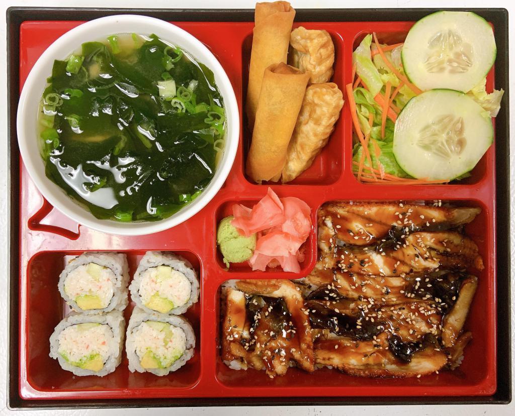 Unagi Bento Box · Served with steamed rice, house salad, miso soup, 2 pieces veggie egg roll, 2 pieces fried gyoza and 4 pieces California roll.