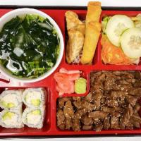 Hibachi Steak Bento · Served with steamed rice, house salad, miso soup, 2 pieces veggie egg roll, 2 pieces fried g...