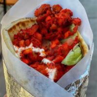 Chicken Gyro · All natural Halal chicken comes in a Pita with lettuce, Tomato, Onions, Cucumbers and White ...