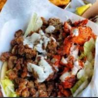 Mix Gyro · All natural Halal chicken and Lamb that comes on a Pita with lettuce, Tomato, Onions, Cucumb...