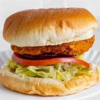 Chicken Sandwich · Fried chicken sandwich served on Brioche bun that includes lettuce, tomato, onions, pickles,...