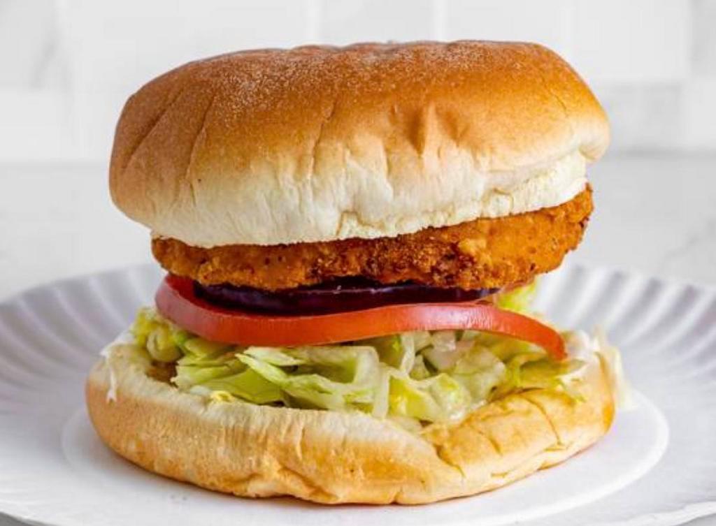 Chicken Sandwich · Fried chicken sandwich served on Brioche bun that includes lettuce, tomato, onions, pickles, mayo, ketchup.