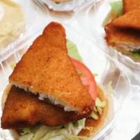 Fish Sandwich · Fried Flounder fish sandwich served served on Brioche bun that includes lettuce, tomato, oni...