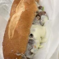 Philly Cheesesteak · Fresh halal steak served on fresh Hero Bread with Cheese, Mayo, Ketchup, Onions, Green Peppe...