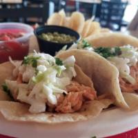 2 Soft Tacos Combo Special · Choice of pulled pork, chopped chicken or brisket. Comes with chips and salsa, jalapeno chut...