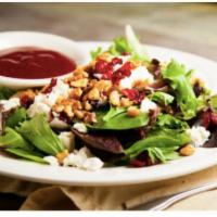 Goat Cheese Salad Dinner · Mixed greens with dried cranberries, walnuts and crumbled goat cheese with raspberry vinaigr...