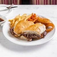 French Dip Supreme Sandwich Dinner · Roasted prime rib of beef sliced thin and piled high with melted mozzarella cheese on garlic...
