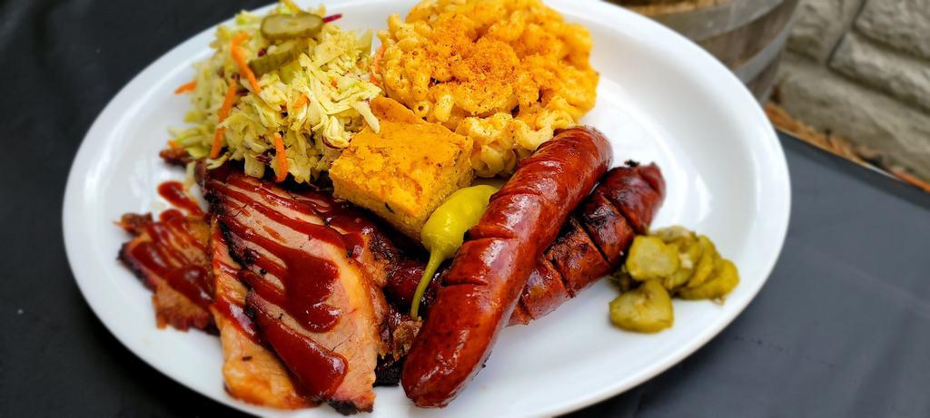 Dual Barrel Platter · Served with choice of 2 sides and 2 BBQ meats.