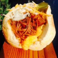 Dirty Dawg · Mac , sausage , cheese , onions , pickle , pulled pork , BBQ sauce 