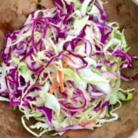 Coleslaw · Cabbage, onions, carrots and vinegar dressing.
(12oz - 16oz)