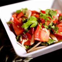 Uyghur Salad · Tomato, Onion, Green pepper, Coriander, Dry red pepper, Salt, Sesame oil, Vinegar (Vegan Foo...
