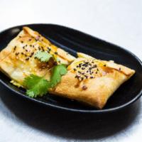 Samsa (2) · Flour, Beef and Onions, Black peppers, Salt, and Sesame (Two piece per serve)