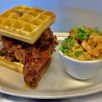 Chicken Fried Pork Chop Waffle Sandwich · Served with Cajun Potato Salad!