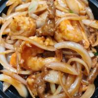 CS11. Sauteed Shrimp, Beef and Chicken in Mongolian style · Shrimp, beef and chicken sauteed with green onion and white onion in chef’s special recipe s...