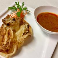 Indian Roti · With Massaman curry dipping sauce.