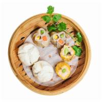 Dim Sum Sampler · 2 Mushroom dumpling, 2 crab shumai and 2 char siu duck bun.