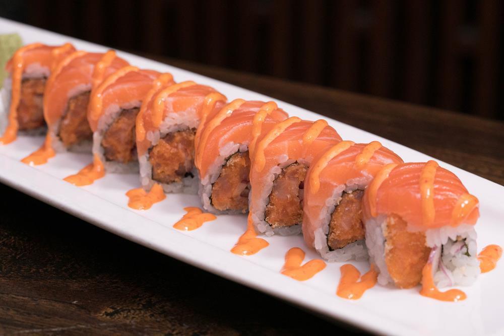 Spicy Queen Roll · Salmon, spicy salmon, onion, ginger, tempura flakes, tobiko and Gochujong mayo.