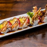 Spider Roll · Soft shell crab, Avocado, cucumber, lettuce and tobiko.