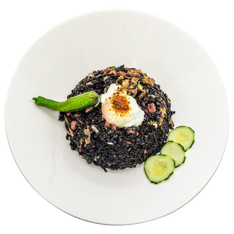 Oink Oink Fried Rice · Black rice, shishito, carrots, green peas, pork belly, bacon, Chinese sausage, scallion and egg.