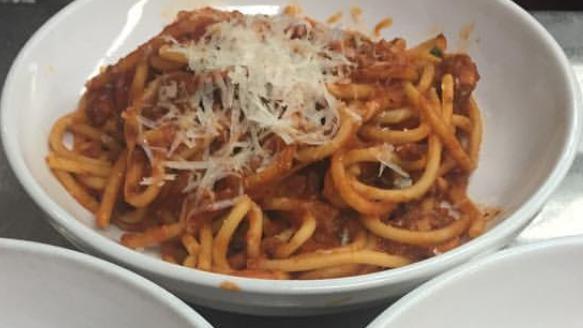 Bucatini alla Amatriciana  · Pancetta, onions, fresh tomato sauce, and pecorino cheese.