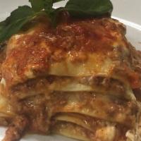 Lasagna  · Layered dish with wide flat pasta.